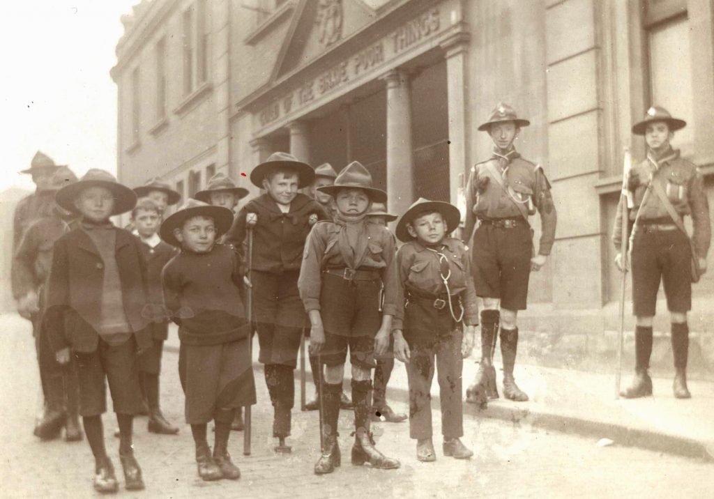 image of young disabled boys outside the School of the Brave Poor things in scout uniform
